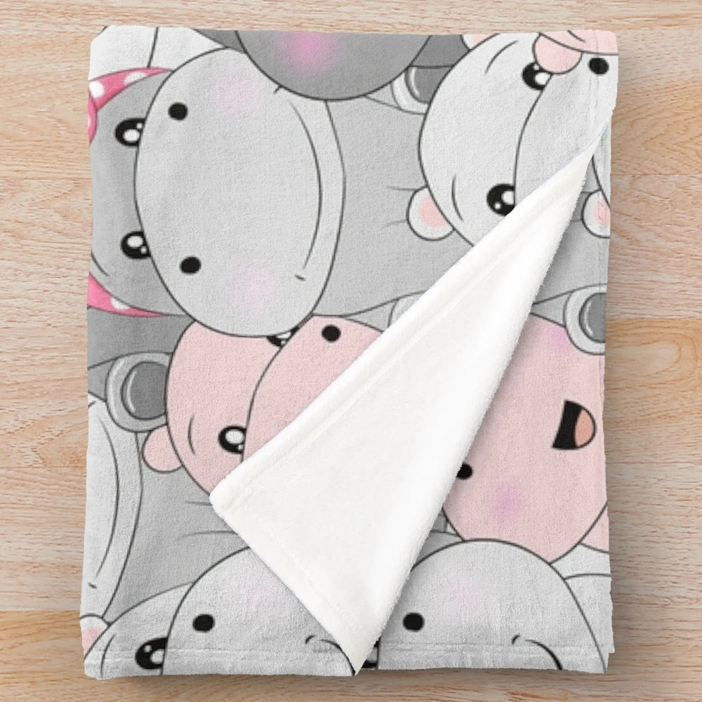 Soft and cuddly hippo patterned plush blanket for cozy home decor