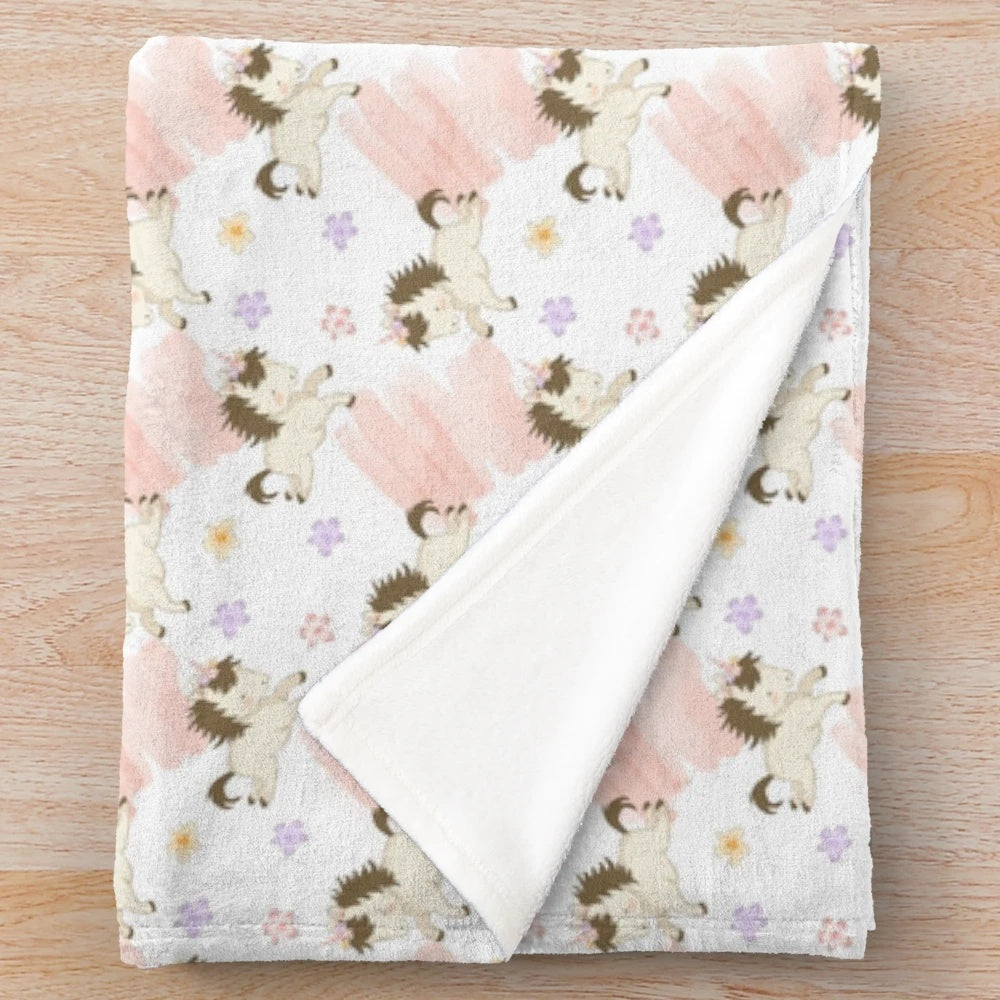 Soft and cozy plush blanket featuring an adorable horse illustration pattern