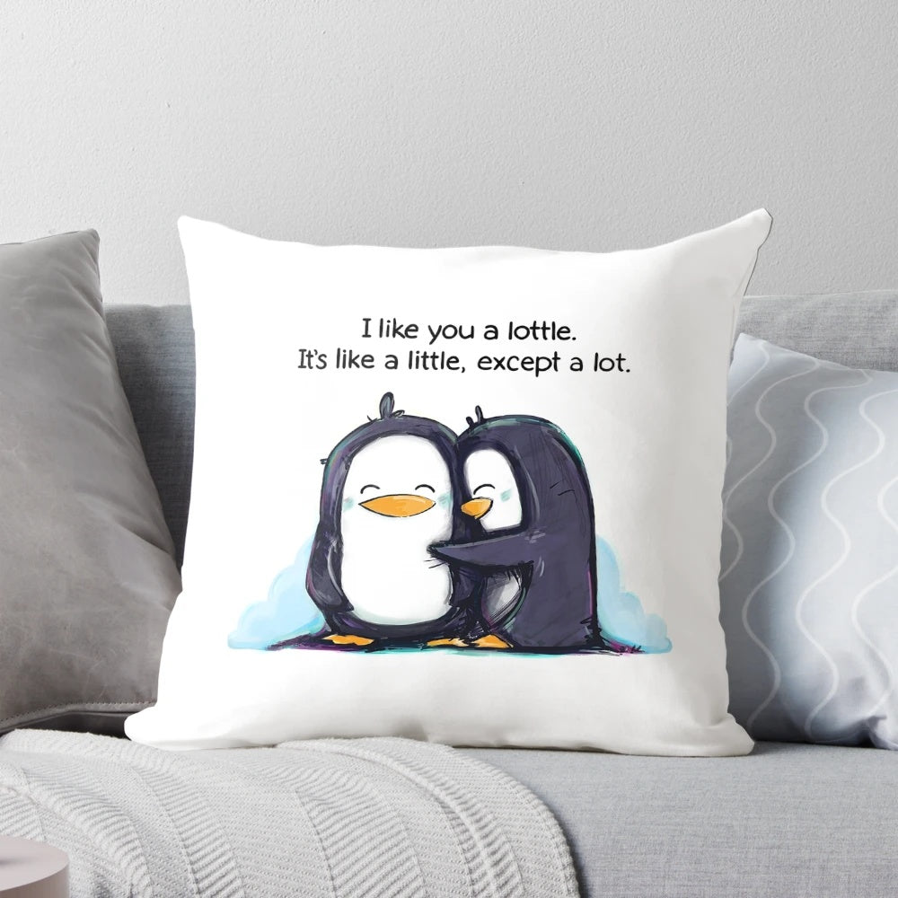 Cute and cuddly penguins hugging on a soft, plush pillow with the text 'I Like You a Lottle'