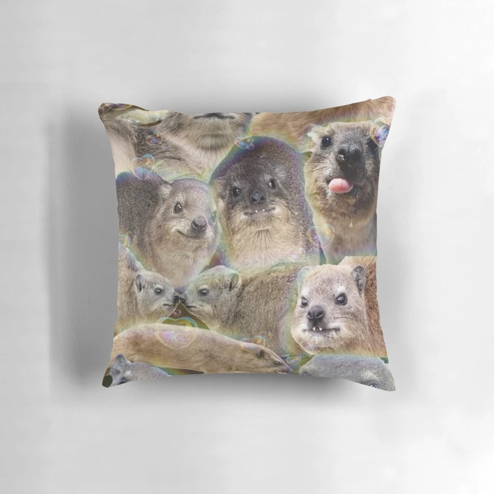 A soft, plush pillow featuring a cuddly hyrax rodent design.