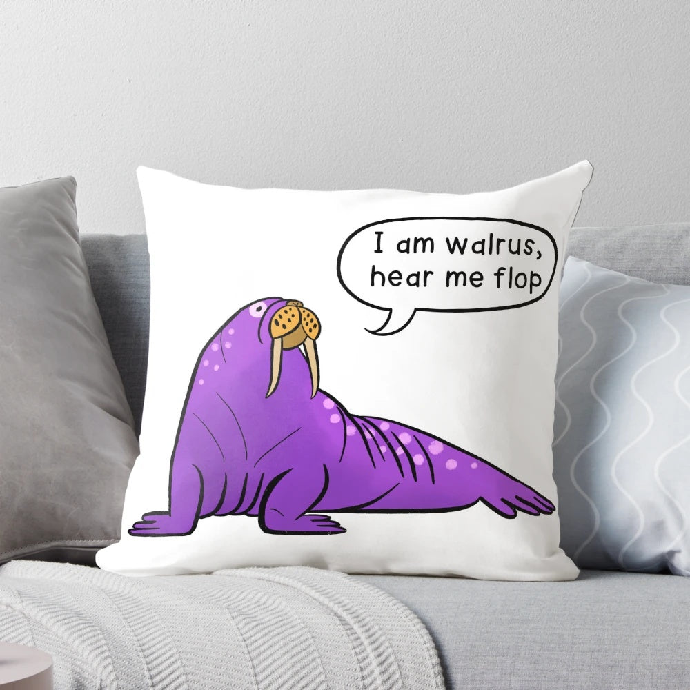 A cozy, whimsical pillow featuring a cartoon walrus with the text "I Am Walrus, Hear Me Flop".