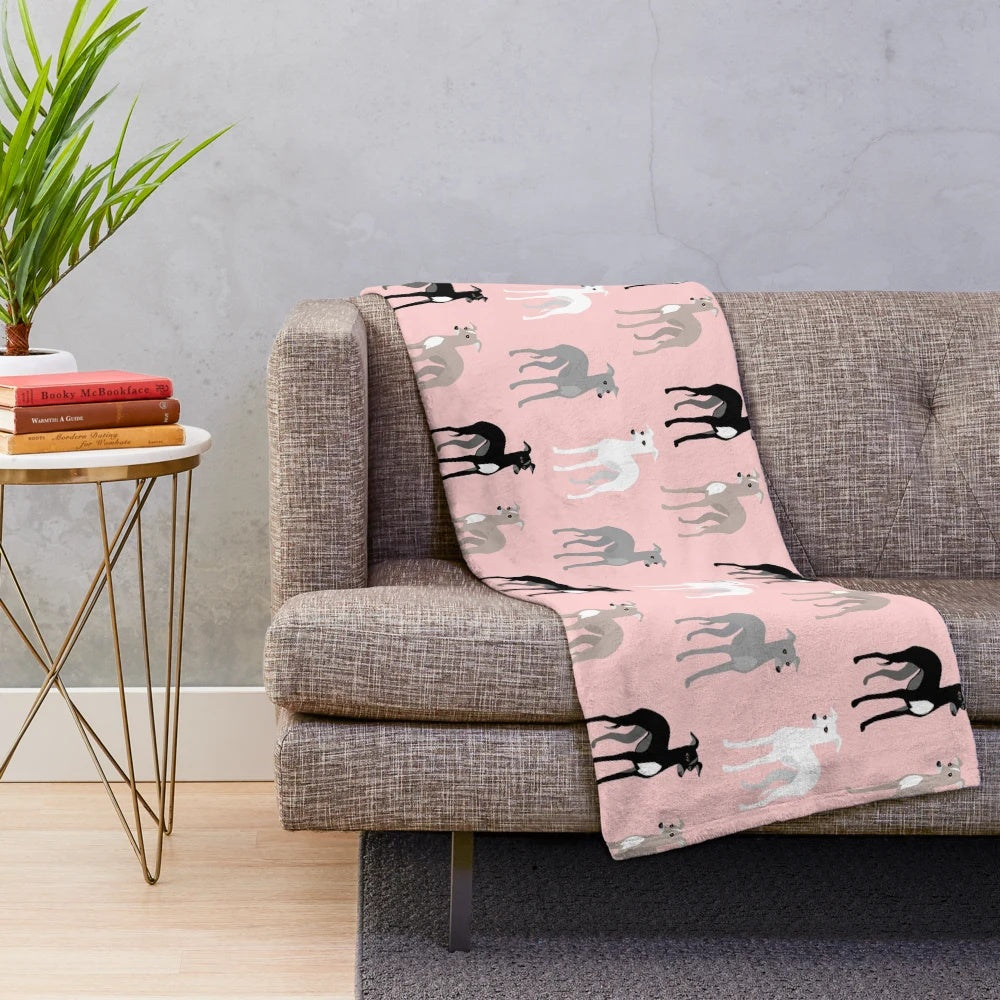 Soft and cozy plush blanket featuring a pink pattern design with Italian Greyhounds or Whippets