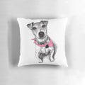 A cozy pillow featuring a Jack Russell Terrier wearing a colorful bandana.