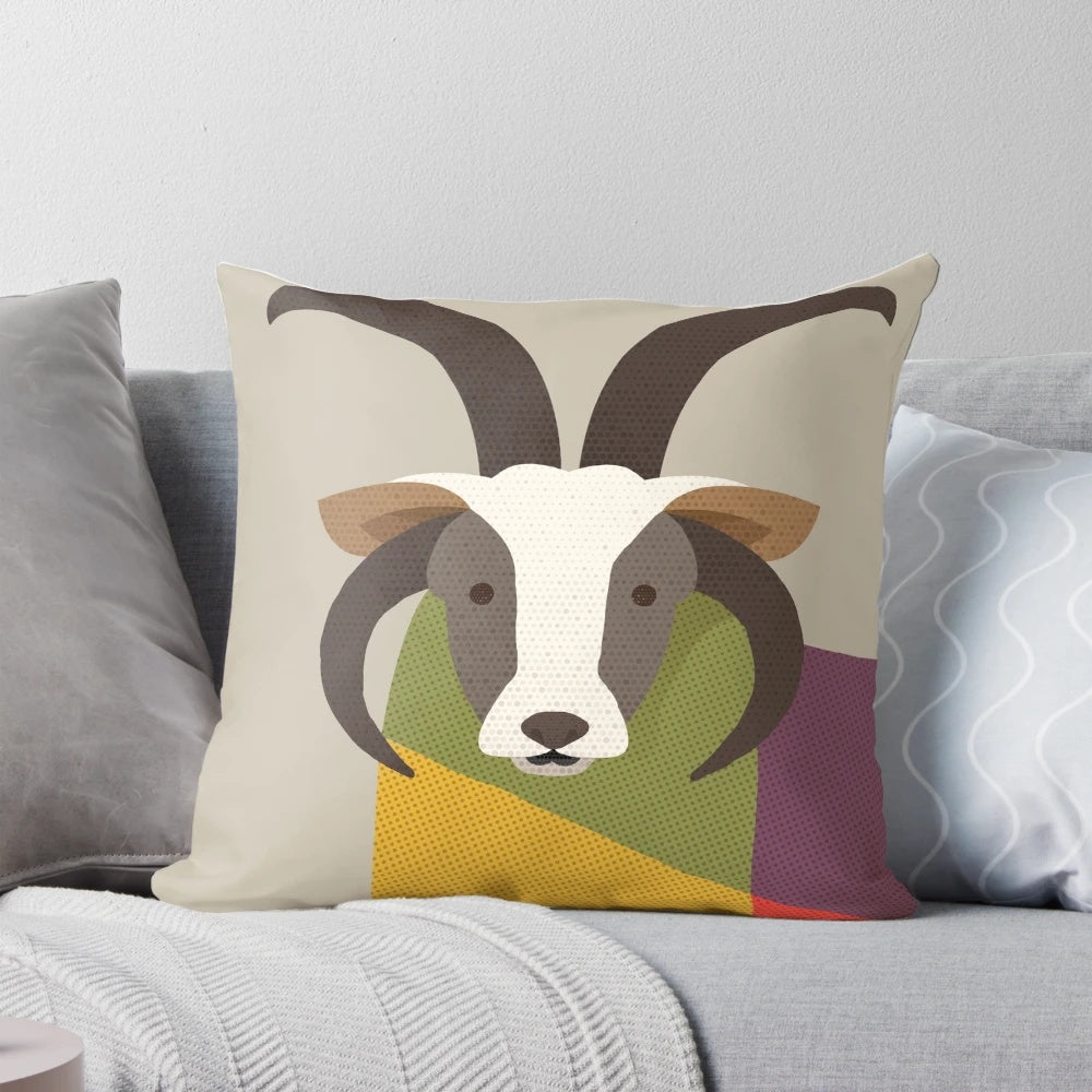 Soft and whimsical jacob sheep pillow with a geometric design, perfect for a baby's nursery or child's room.