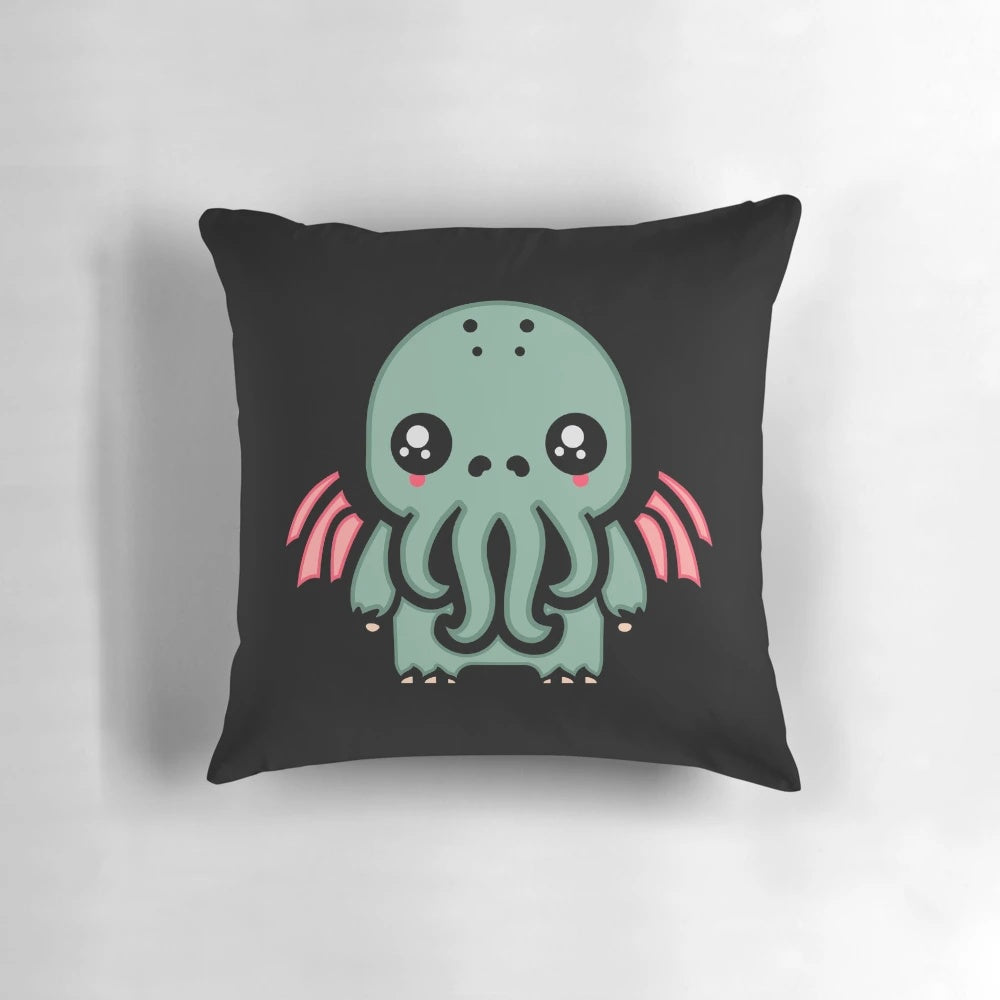 Cute and cuddly Kawaii Cthulhu plush pillow, featuring a whimsical design inspired by the works of H.P. Lovecraft.