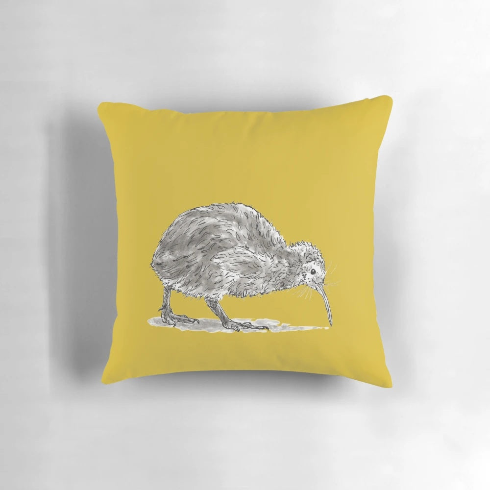 Whimsical illustration of a kiwi bird on a soft, plush pillow