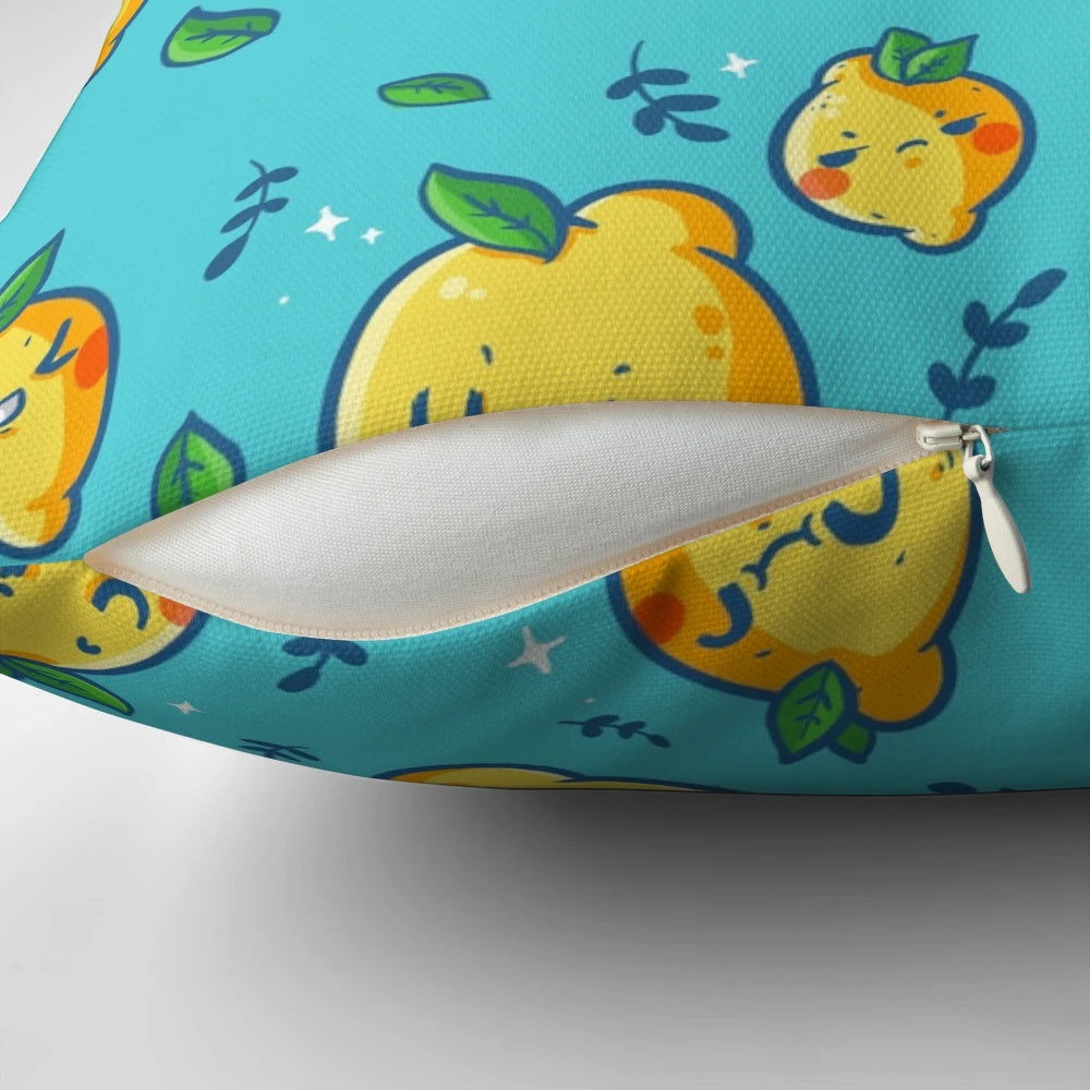 A colorful, cartoon-style throw pillow featuring cute lemon faces in a fun, vibrant pattern.