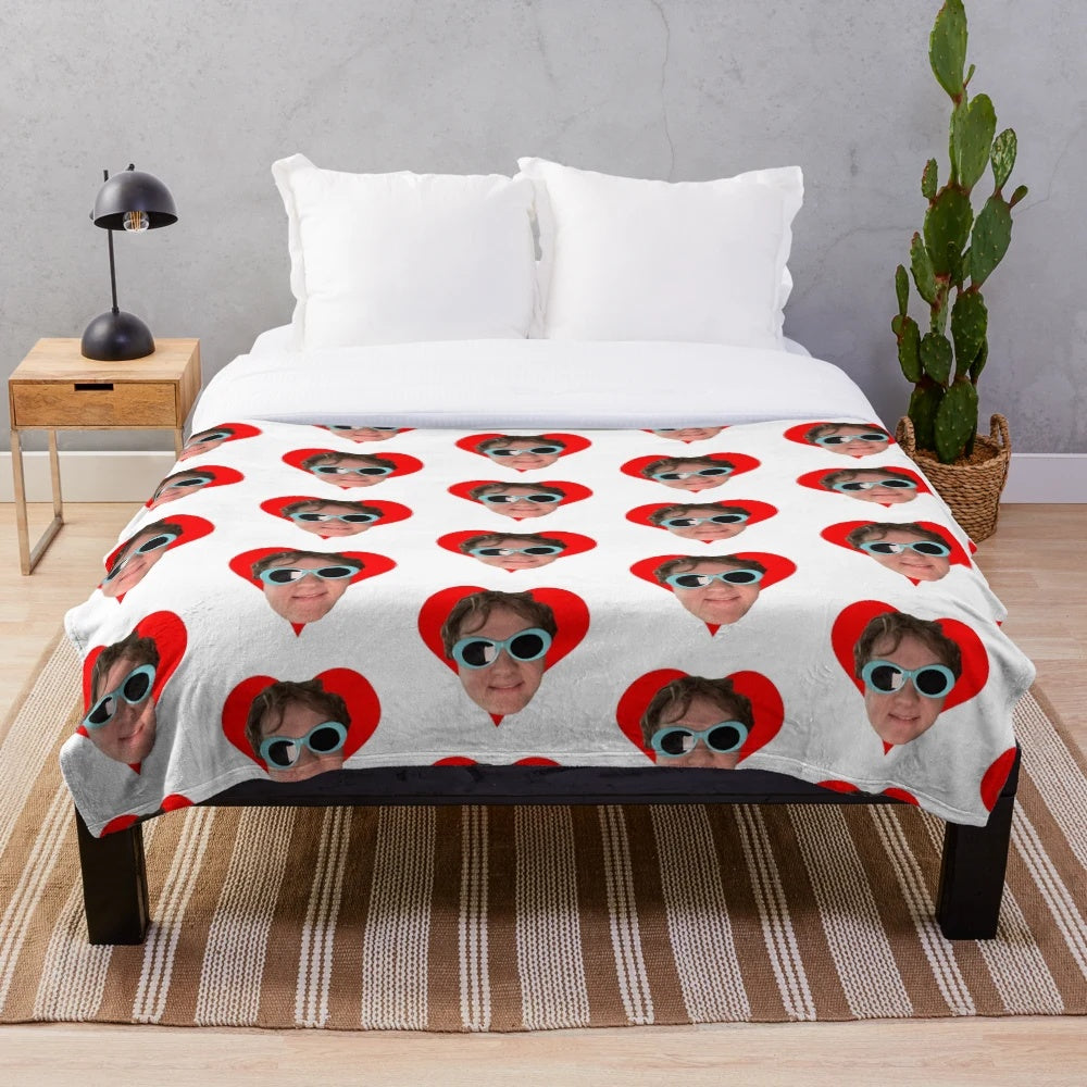 Soft plush blanket with a fun design of Lewis Capaldi's heart and sunglasses