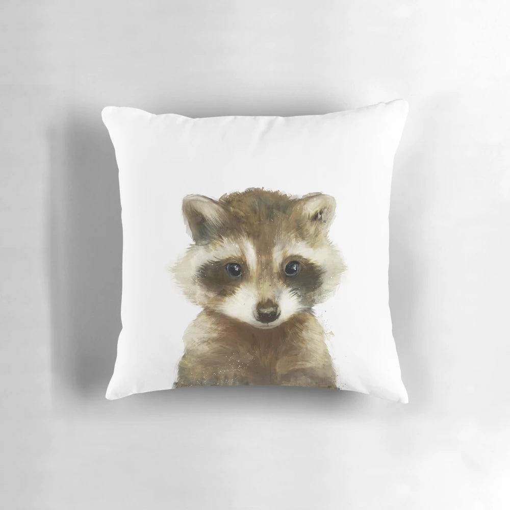 Soft and cuddly little raccoon pillow for a cozy woodland-themed nursery