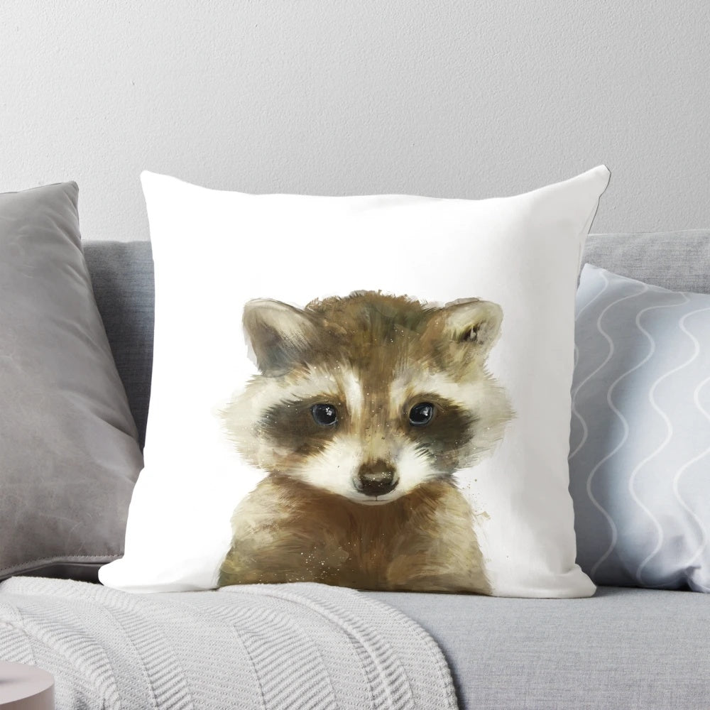 Soft and cuddly little raccoon pillow for a cozy woodland-themed nursery