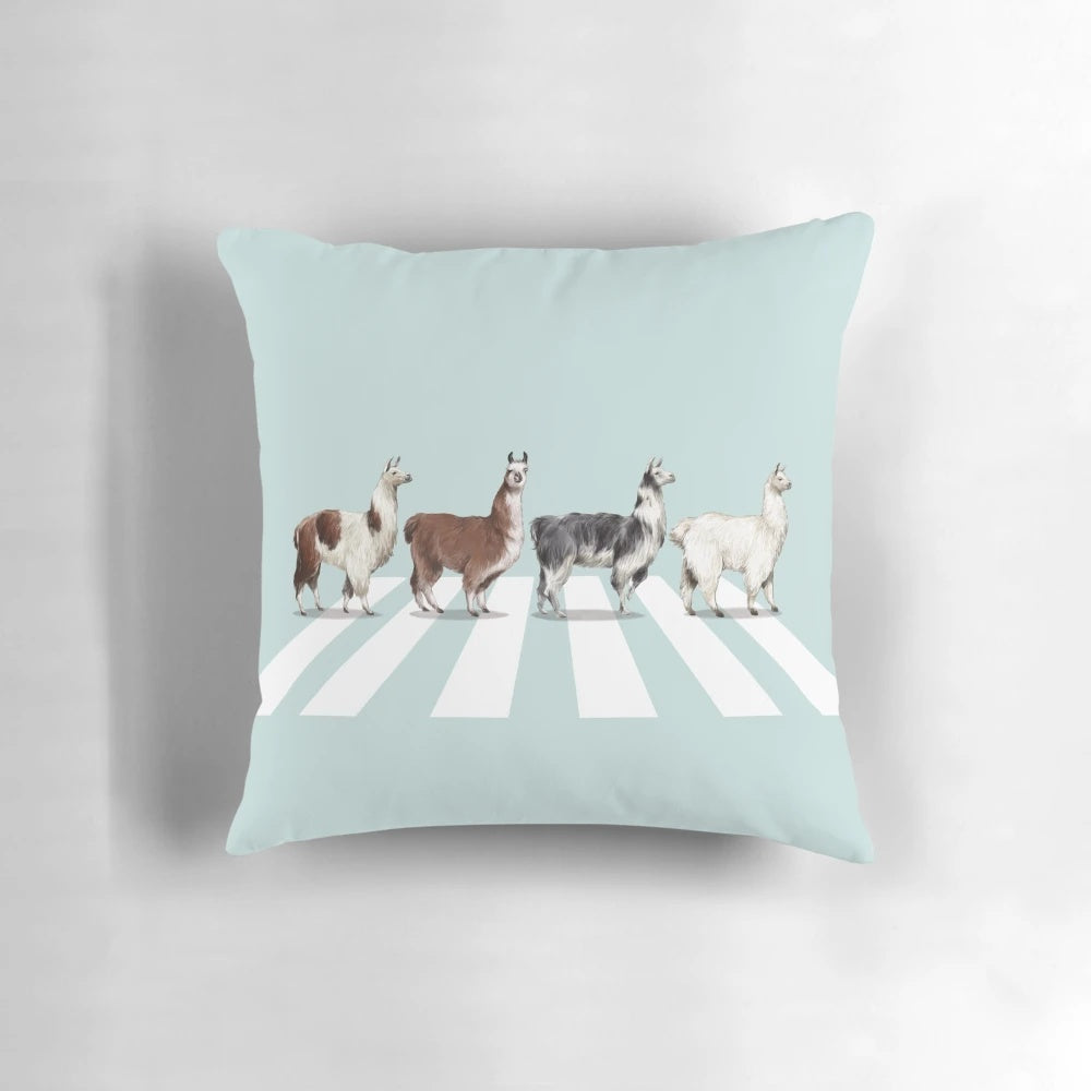 Soft, plush pillow featuring a whimsical llama design inspired by the iconic Beatles album cover
