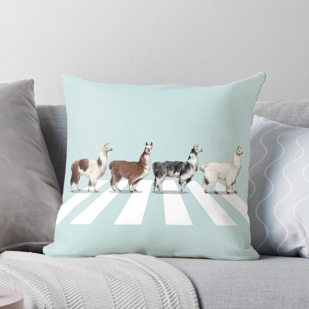Soft, plush pillow featuring a whimsical llama design inspired by the iconic Beatles album cover