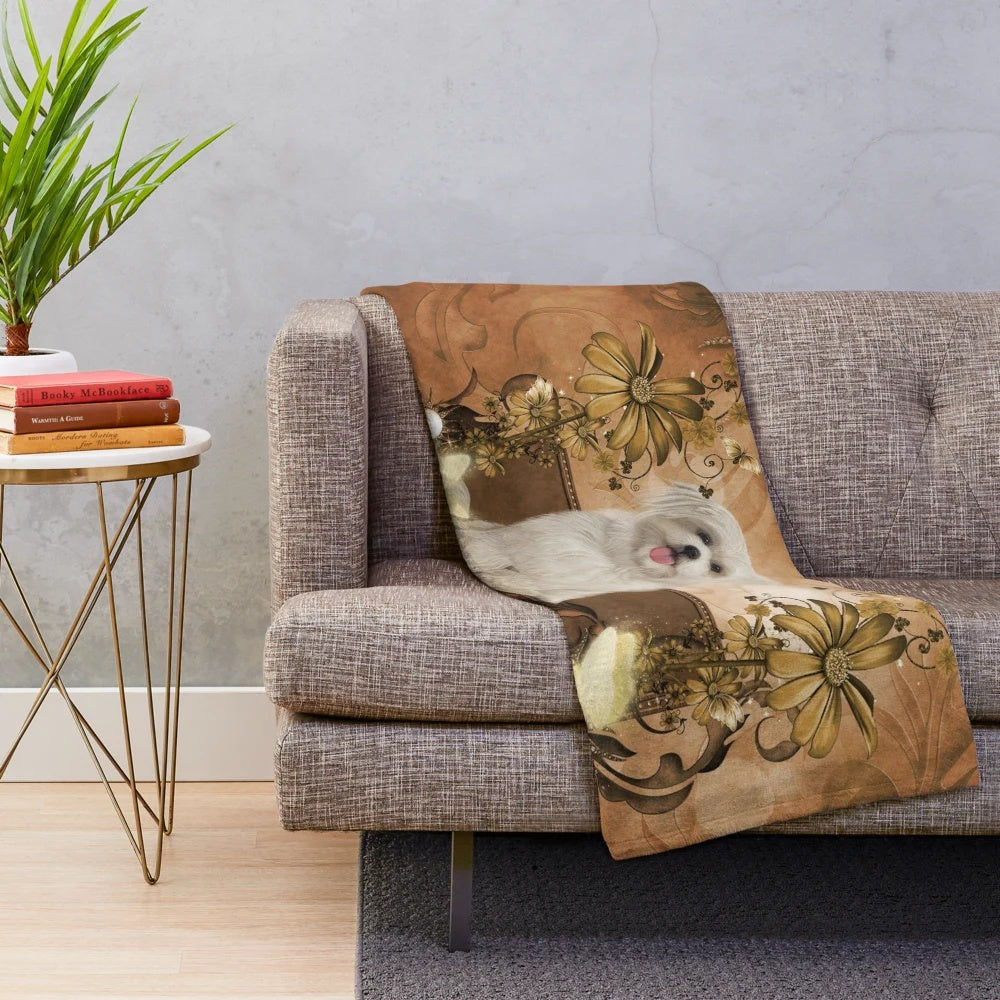 Cozy plush blanket featuring a cute maltese puppy against a floral background