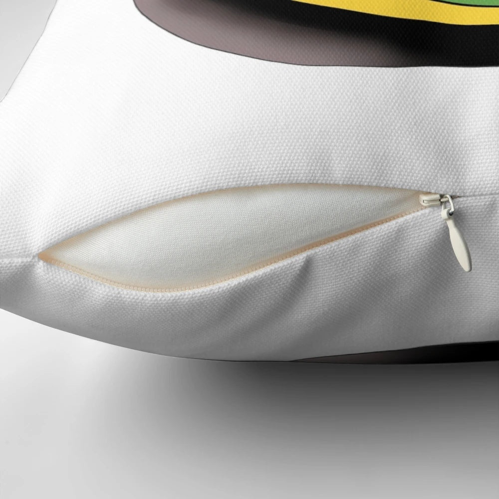 Soft, plush pillow featuring a cute, anthropomorphic Marmite jar with a smiley face, designed by Theodora Gould.