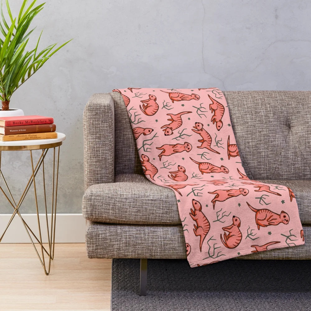 Meerkat plush blanket featuring a cute cartoon pattern of the African suricata suricatta animal