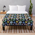 Cute microbes, bacteria, and viruses on a plush blanket