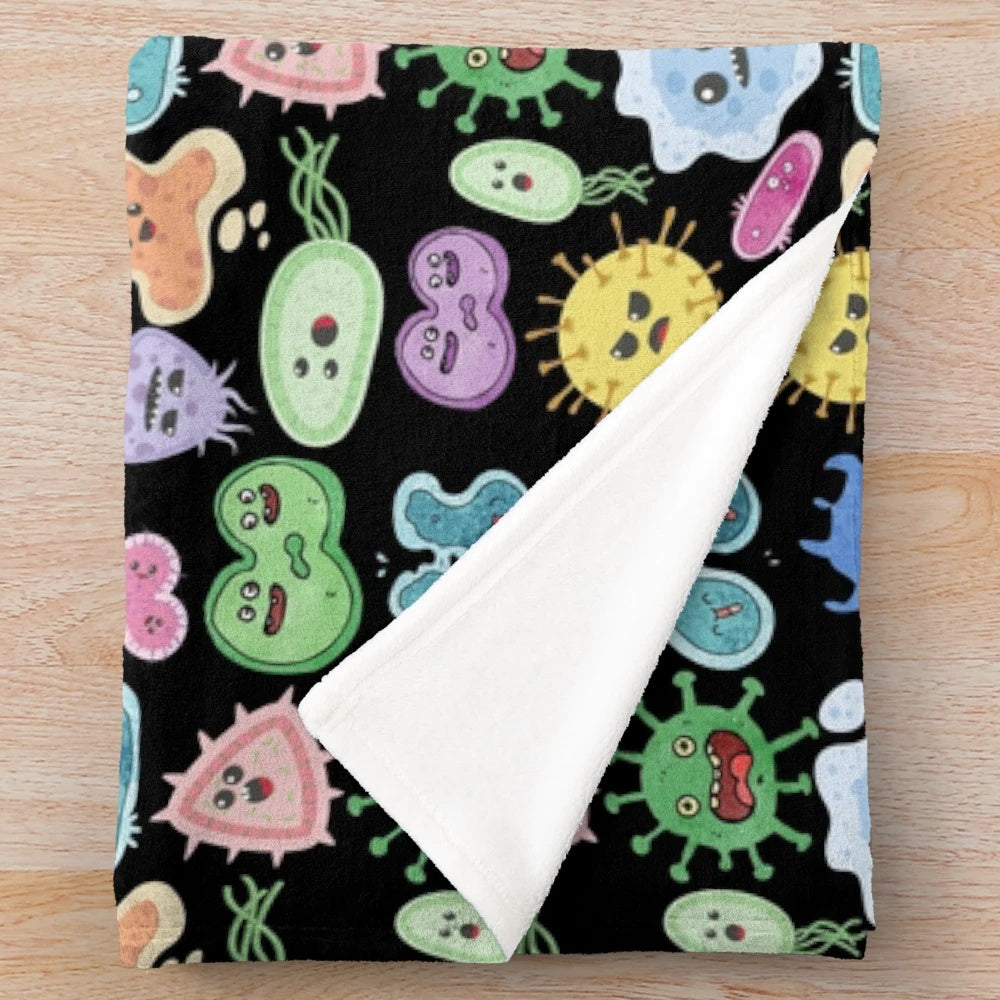 Cute microbes, bacteria, and viruses on a plush blanket