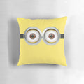 Plush minion-themed pillow with eyes design