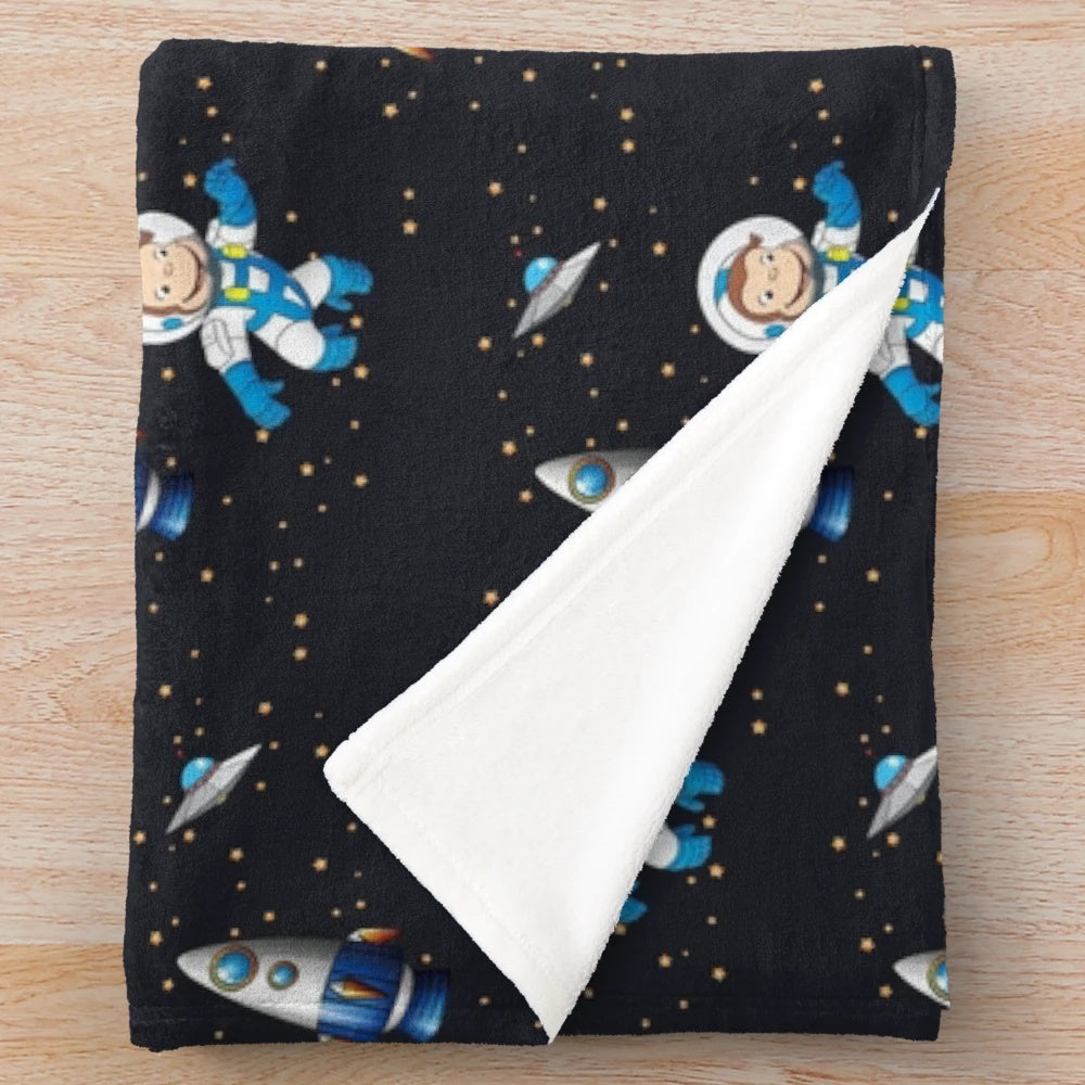 Cartoon monkey astronaut in space scene plush blanket for children's room