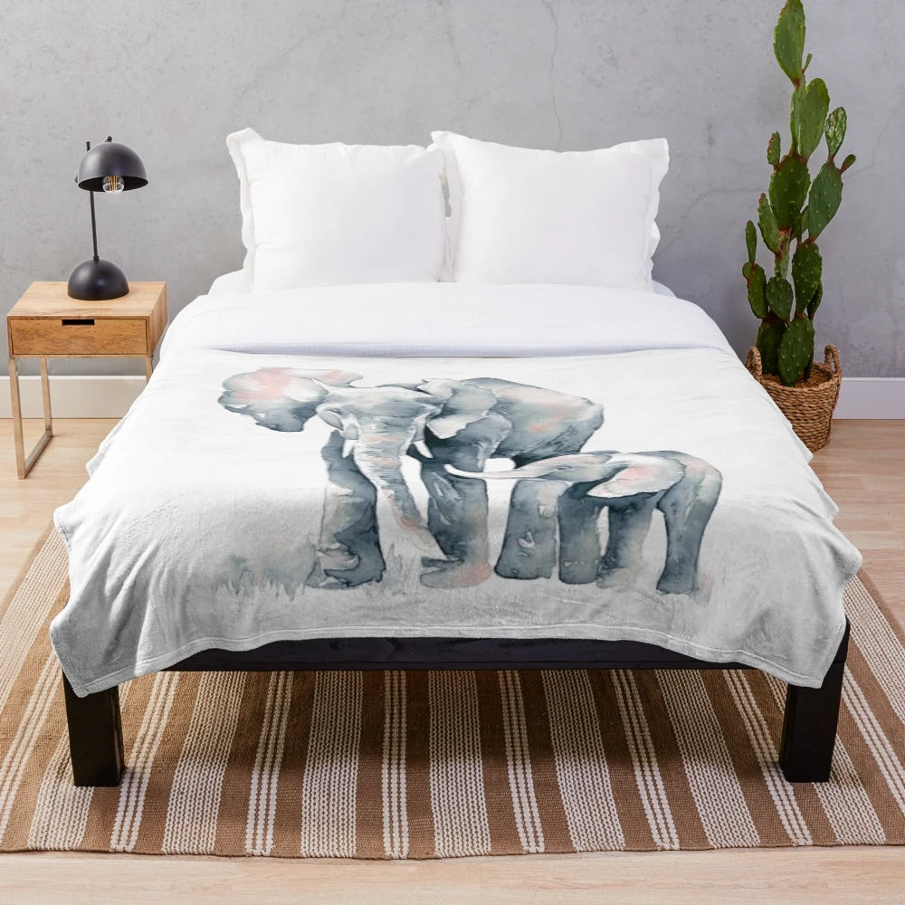 Soft and cozy grey elephant plush blanket featuring a watercolor design of a mother and baby elephant