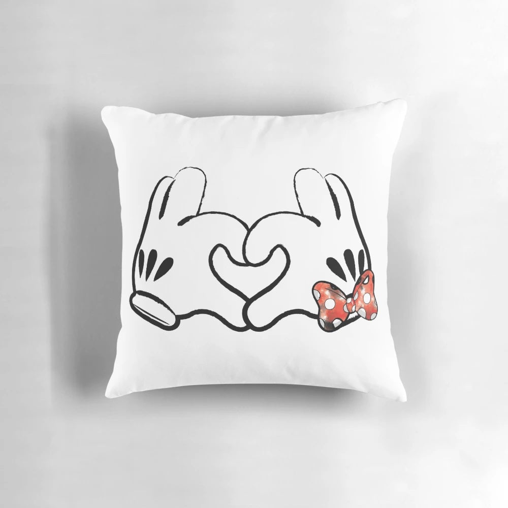 Colorful mouse-themed pillow with splatter paint design