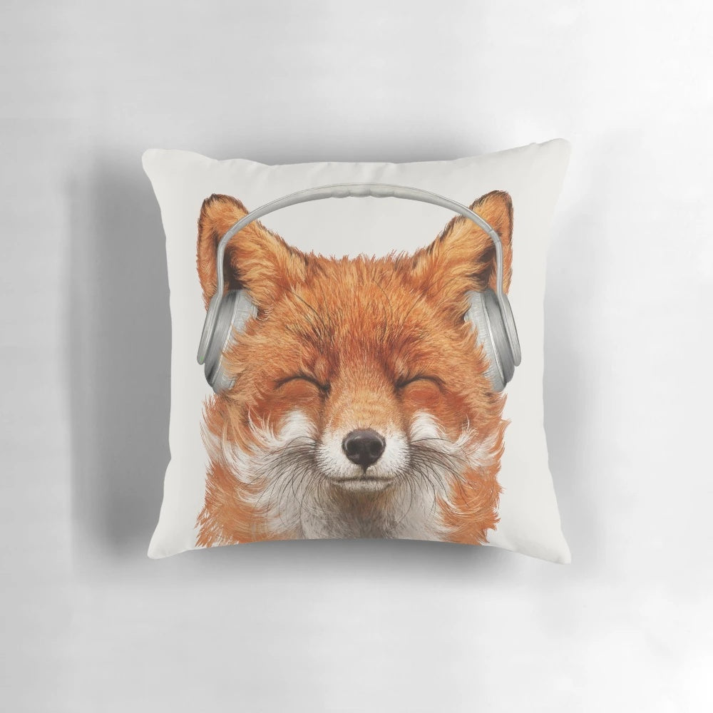 A photo-realistic smiling fox wearing a DJ headset and mustache on a soft, plush pillow.