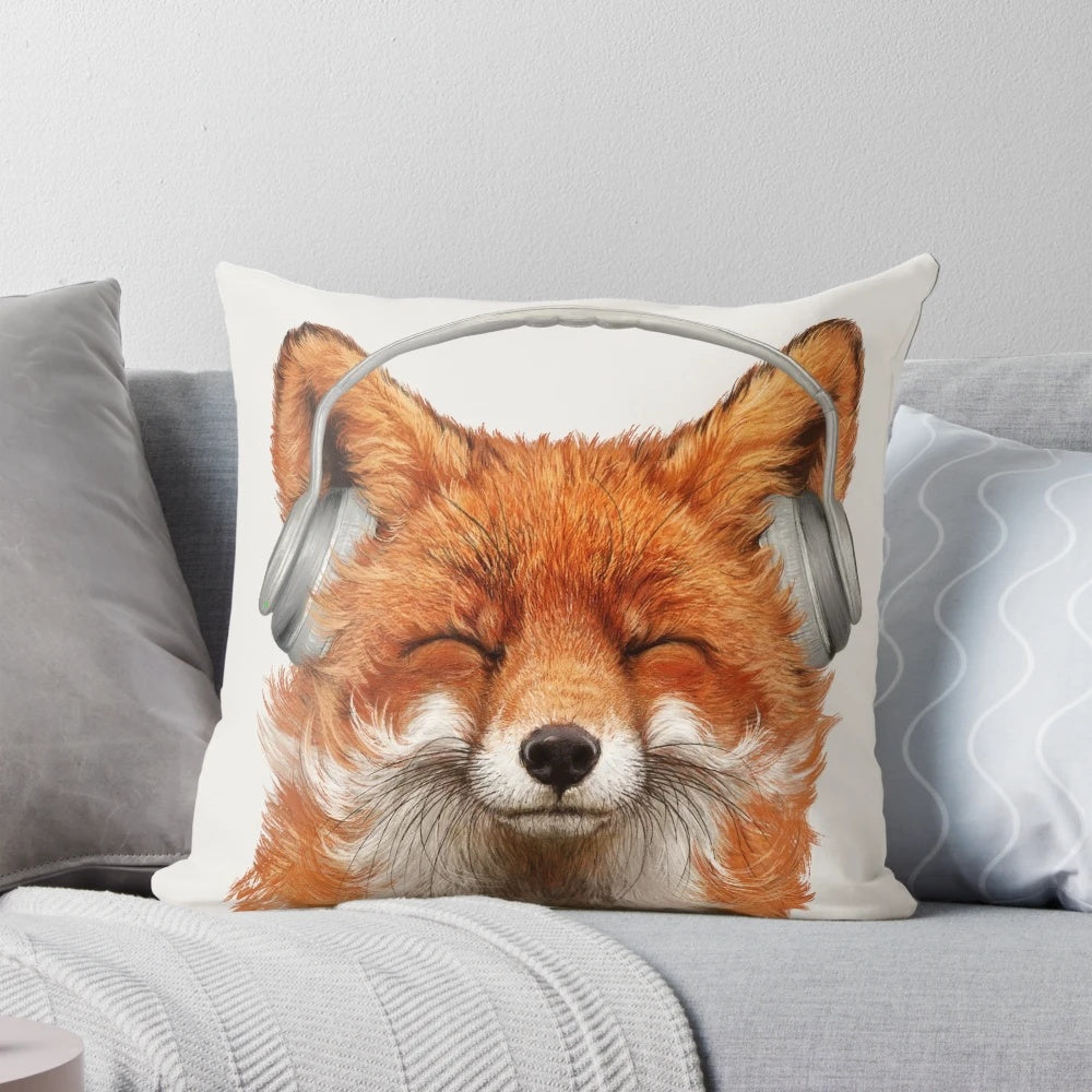 A photo-realistic smiling fox wearing a DJ headset and mustache on a soft, plush pillow.