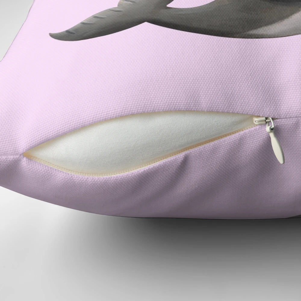 Cute plush narwhal with donut throw pillow, perfect for decorating a child's room or nursery.