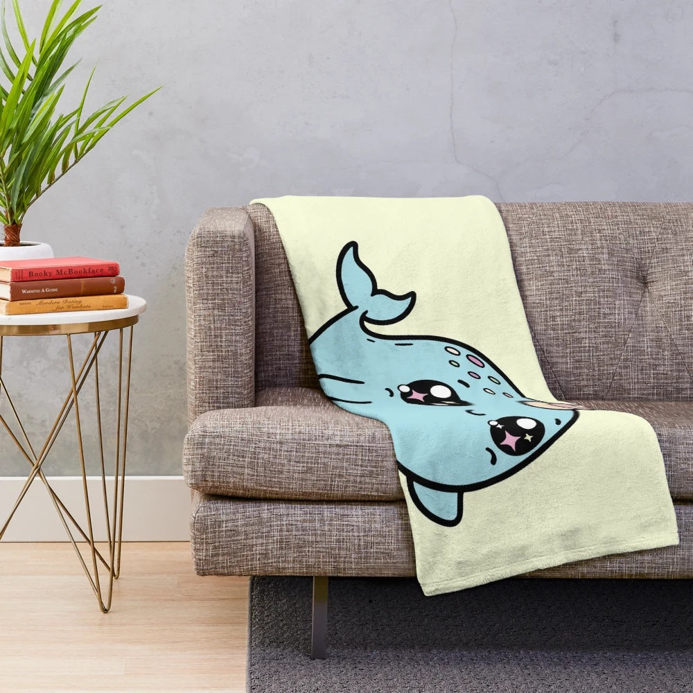 Soft and cuddly narwhal plush blanket in a blue shade