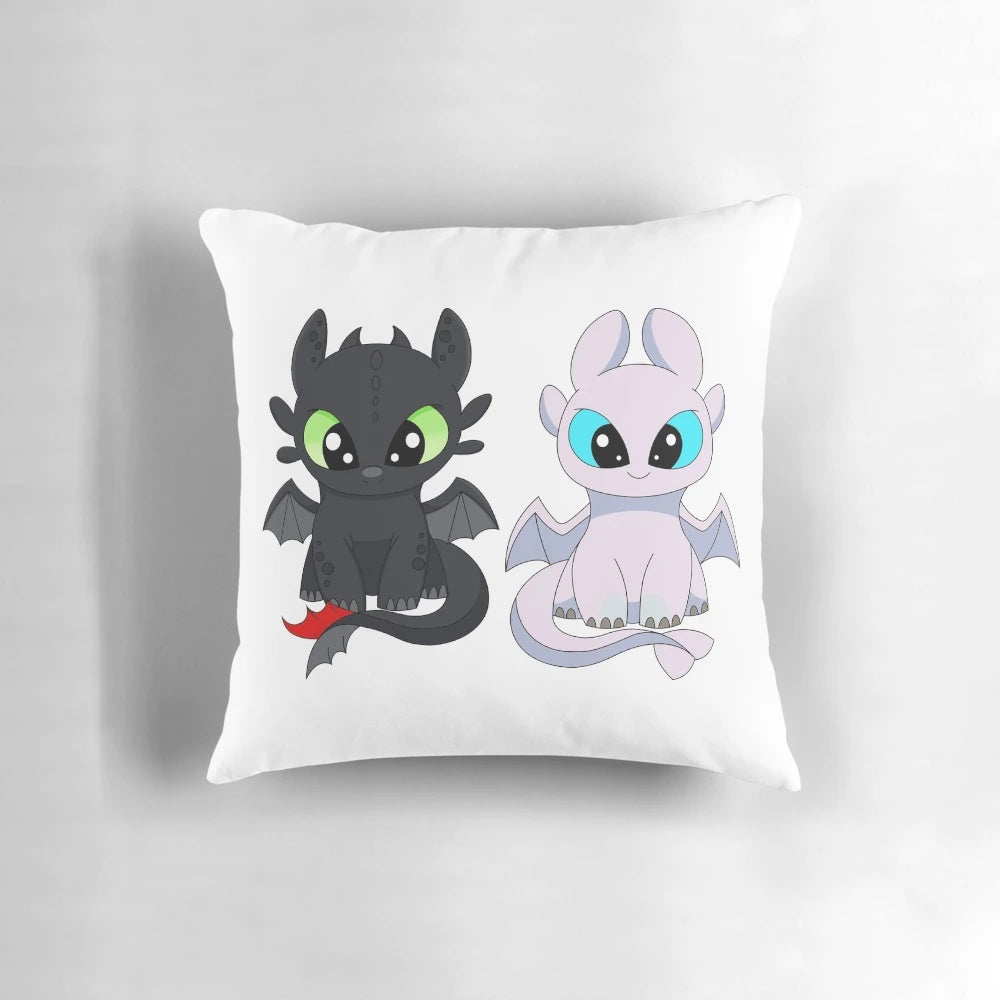 Soft, plush pillow featuring the iconic Toothless and Light Fury dragon babies from the How to Train Your Dragon franchise.