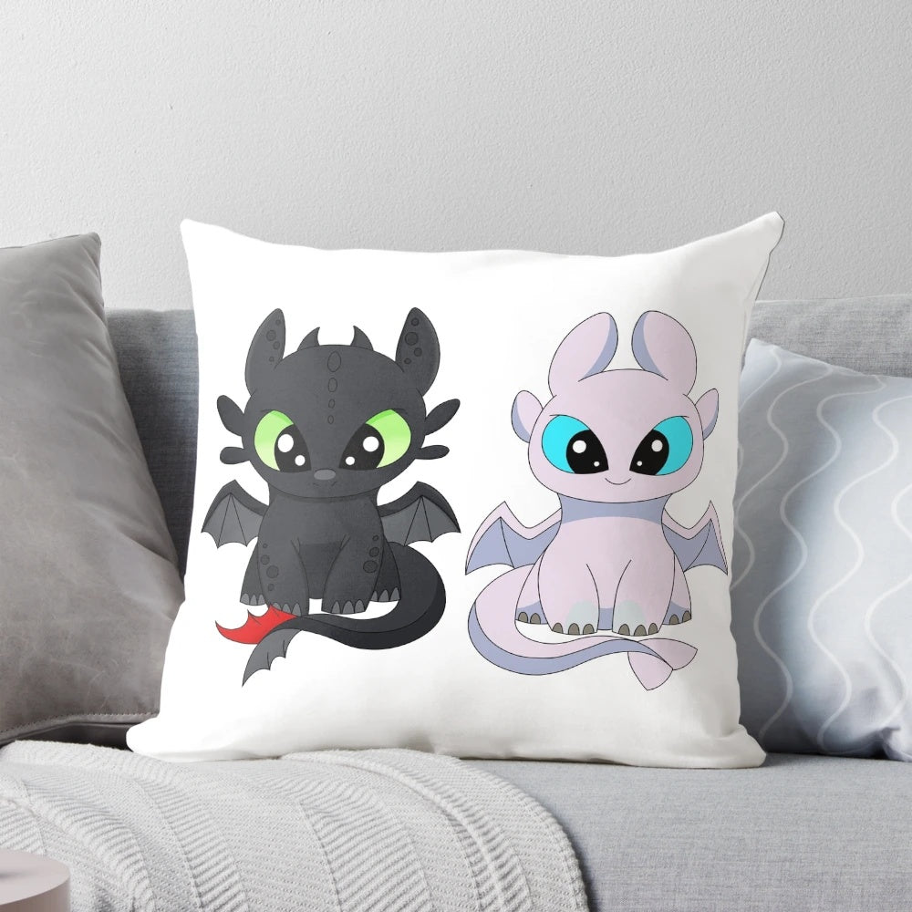 Soft, plush pillow featuring the iconic Toothless and Light Fury dragon babies from the How to Train Your Dragon franchise.