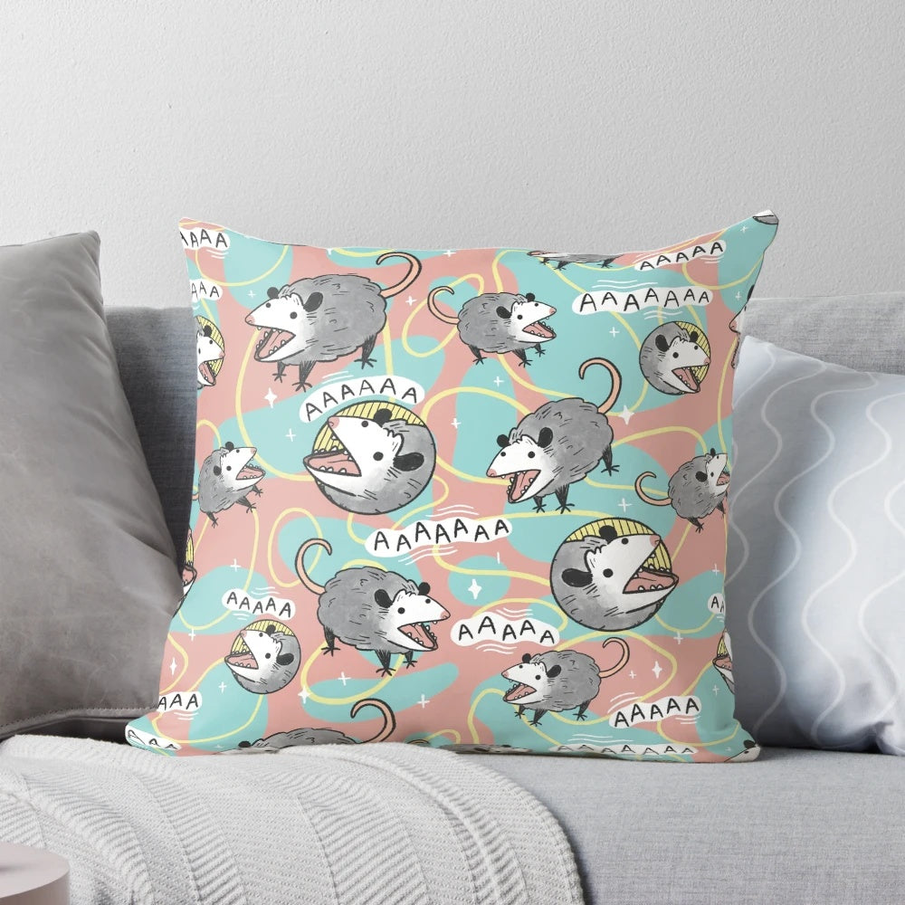 Cute and whimsical opossum pillow with a screaming expression, perfect for adding a touch of retro-inspired nature decor to your home.