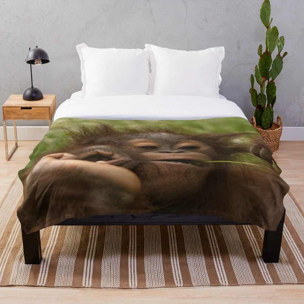 Orangutan baby plush blanket with soft, cuddly design