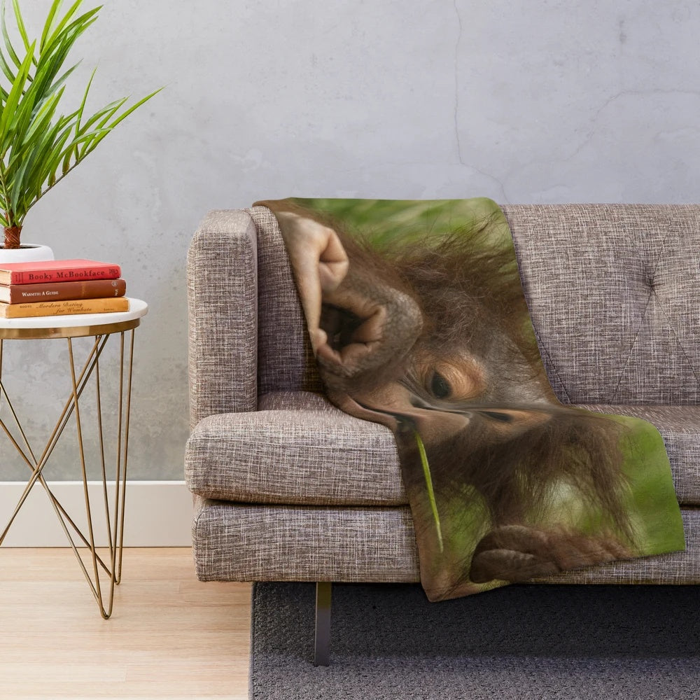 Orangutan baby plush blanket with soft, cuddly design