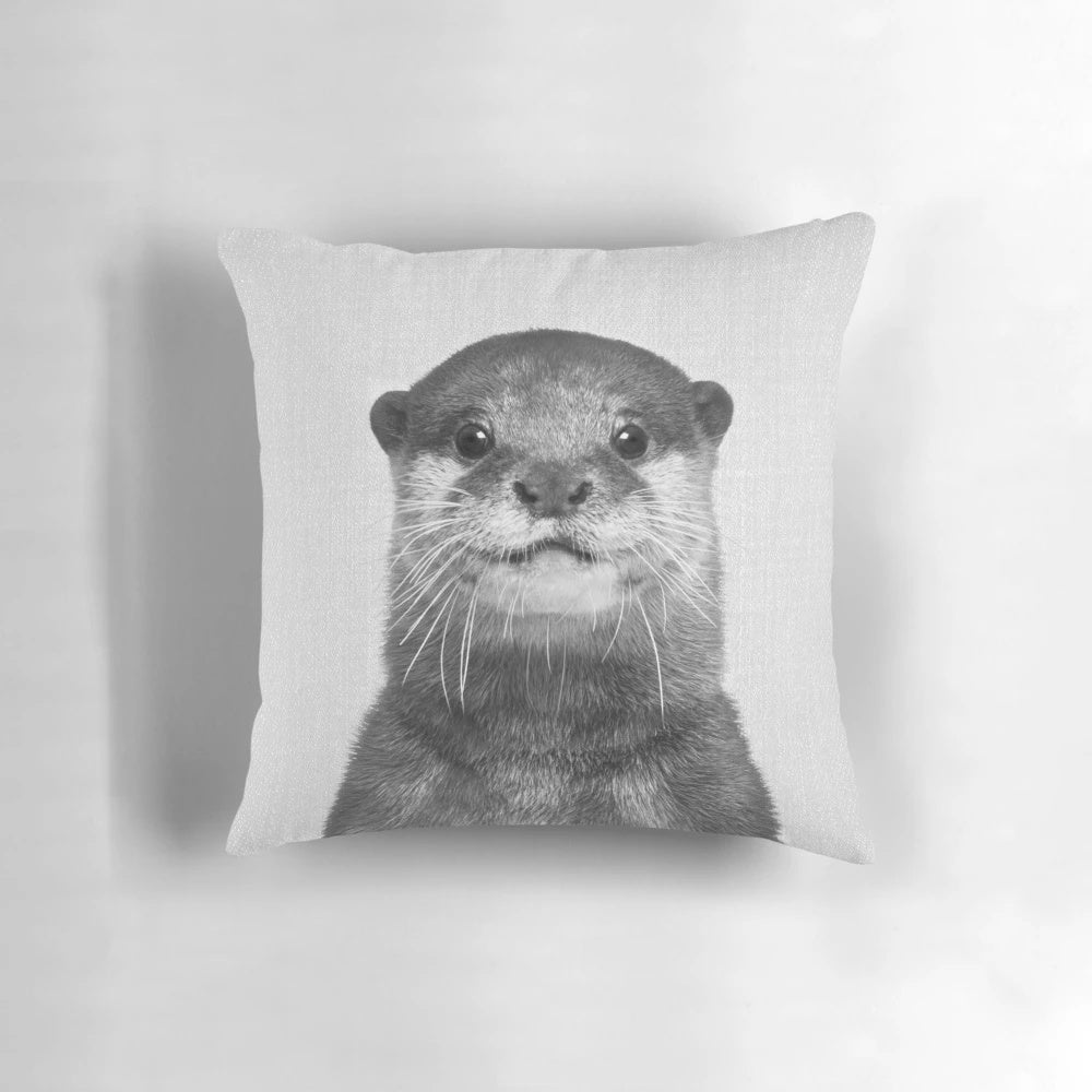 Otter black and white decorative pillow with nature and wildlife design