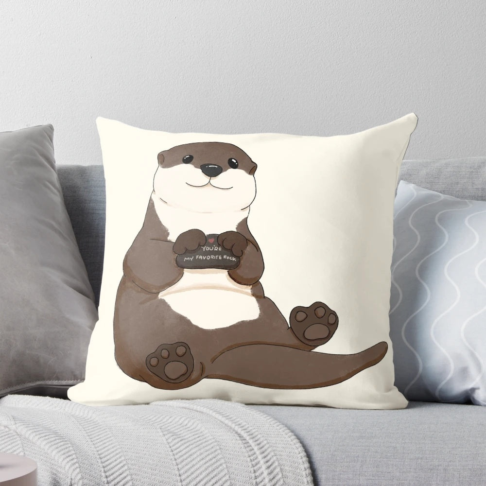 Cute and smiling otter printed on a cozy pillow, perfect for adding a touch of adorable to any space.
