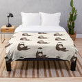Cute otter plush blanket with a soft, fuzzy design