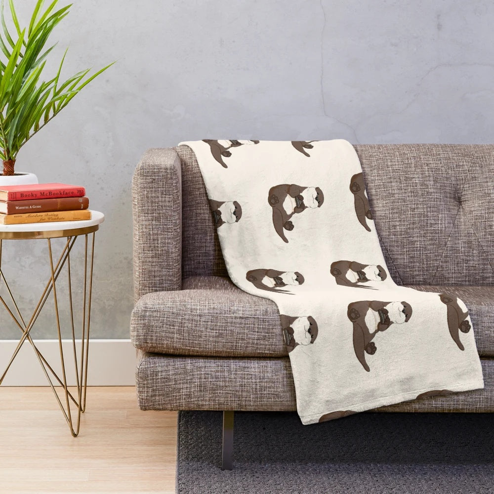 Cute otter plush blanket with a soft, fuzzy design