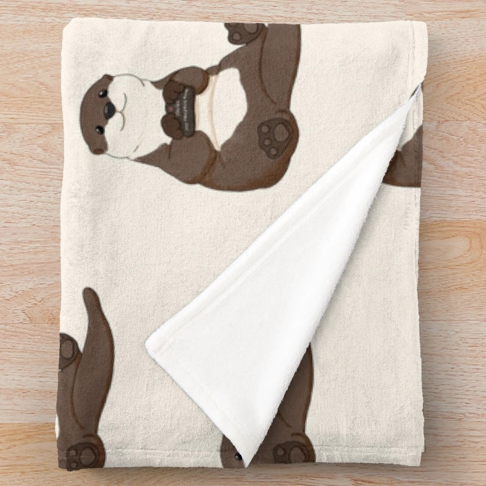 Cute otter plush blanket with a soft, fuzzy design