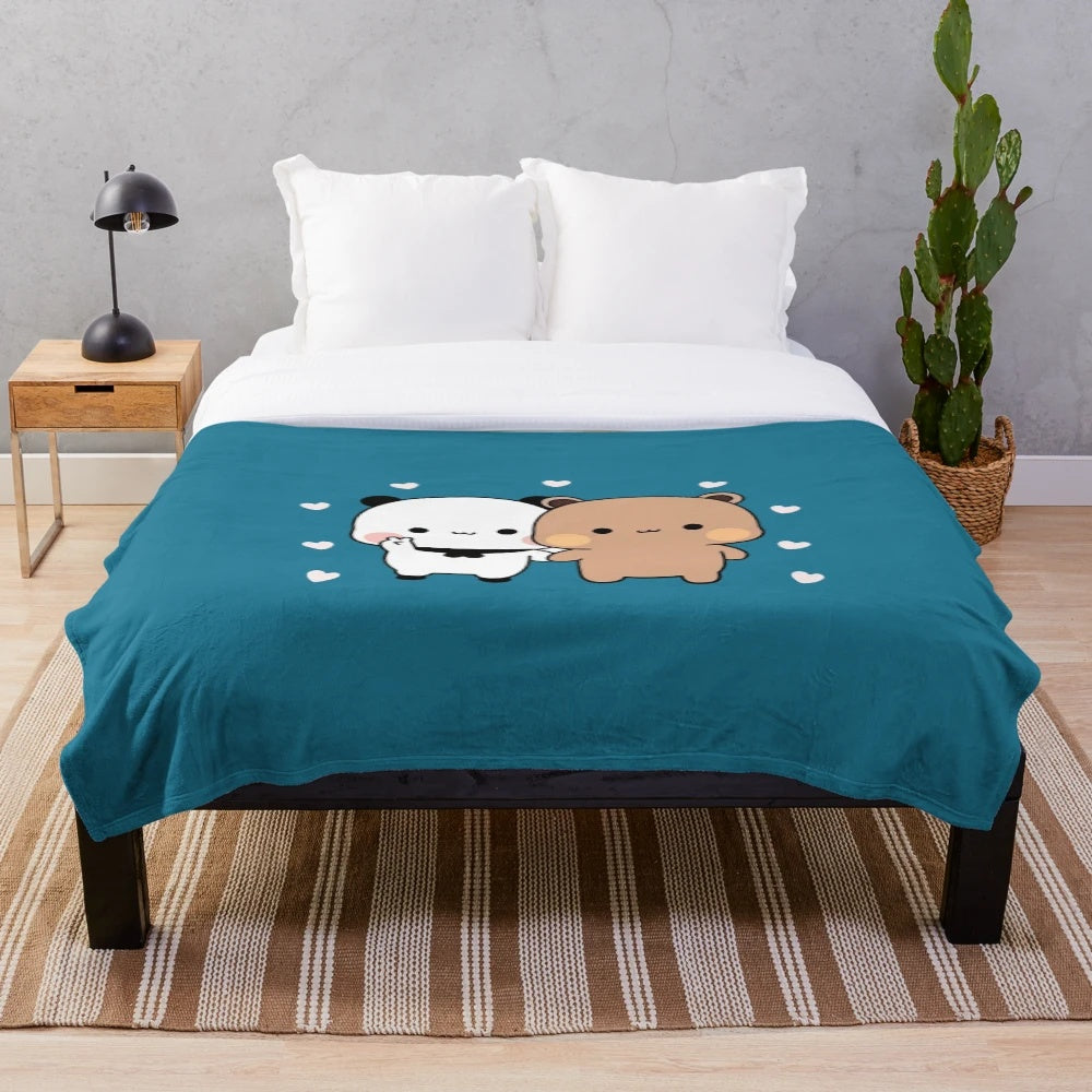 Panda plush blanket with a cute and fluffy panda design