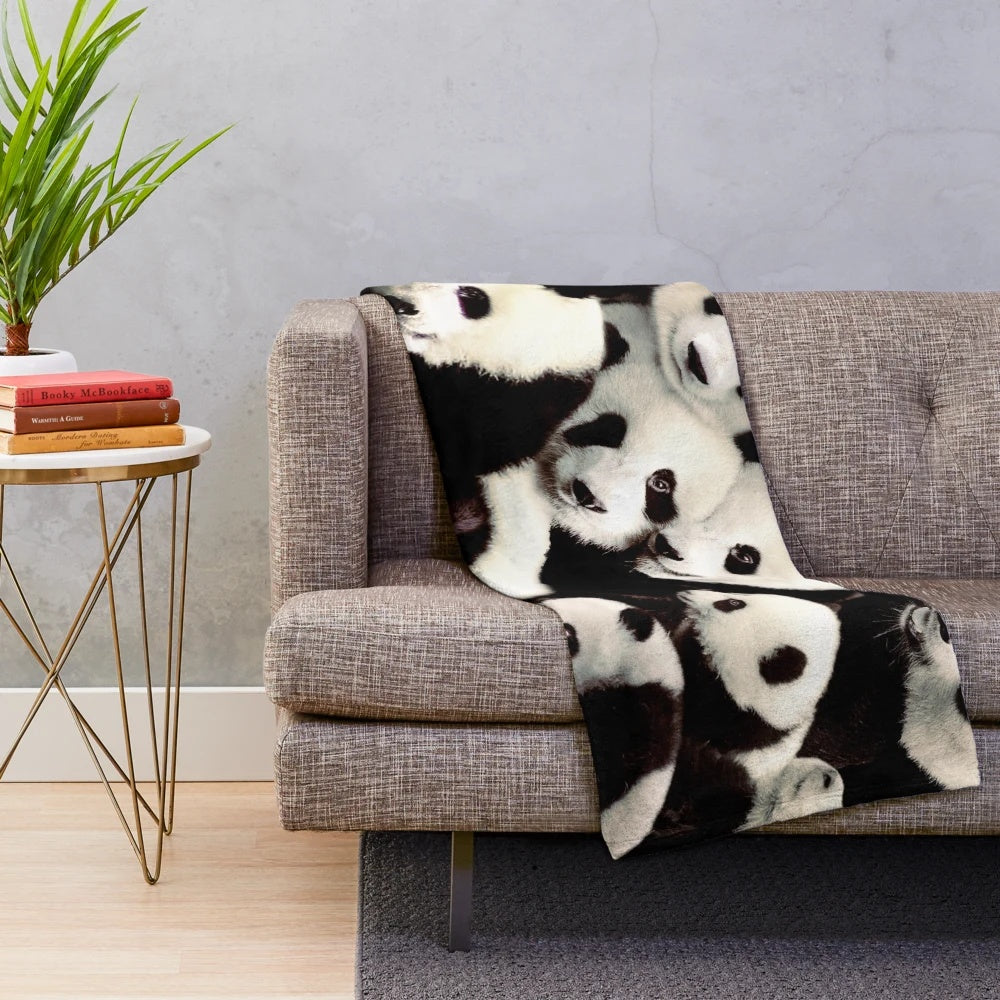 Soft and huggable panda plush blanket for animal lovers