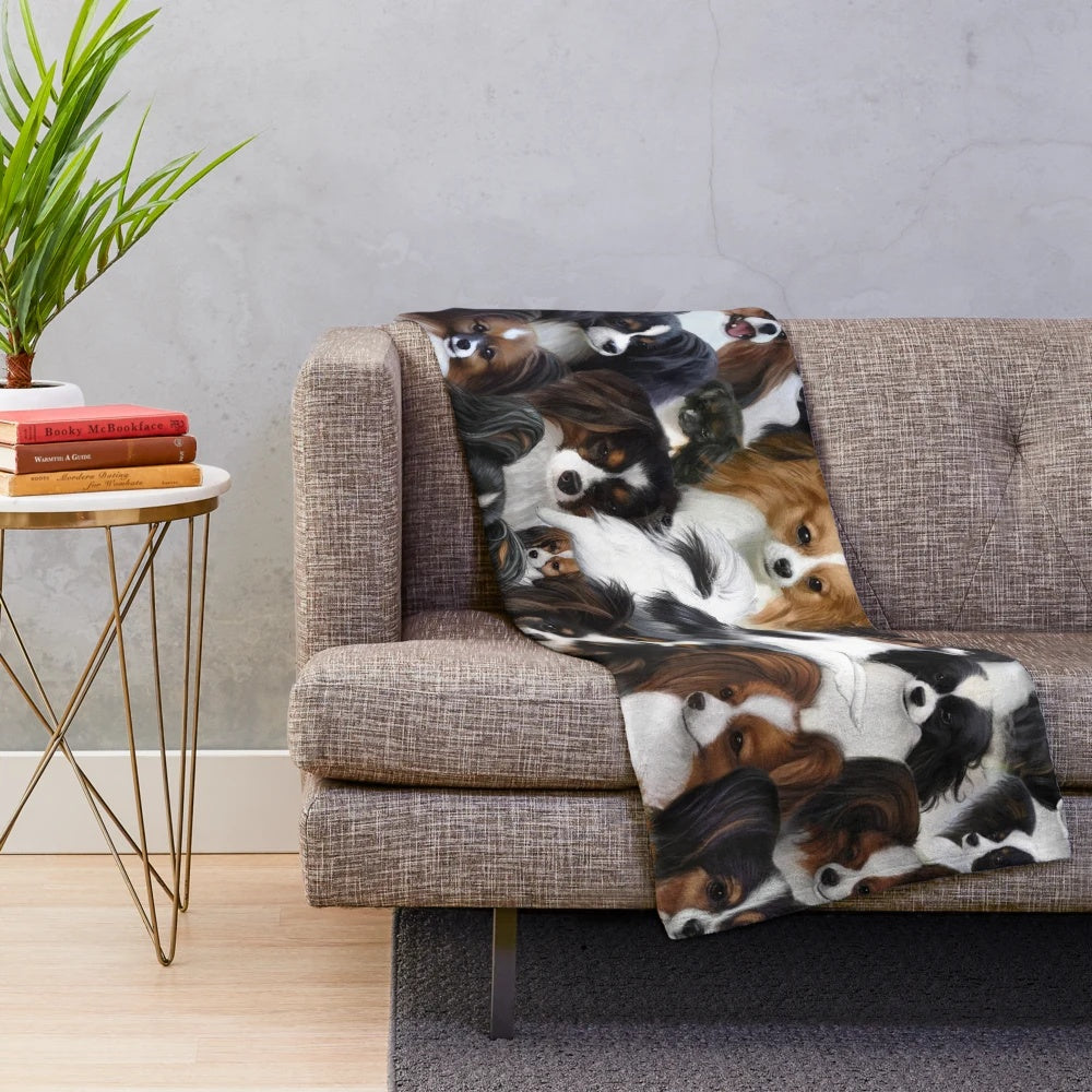 Papillon and Phalene dog collage on a soft, plush blanket