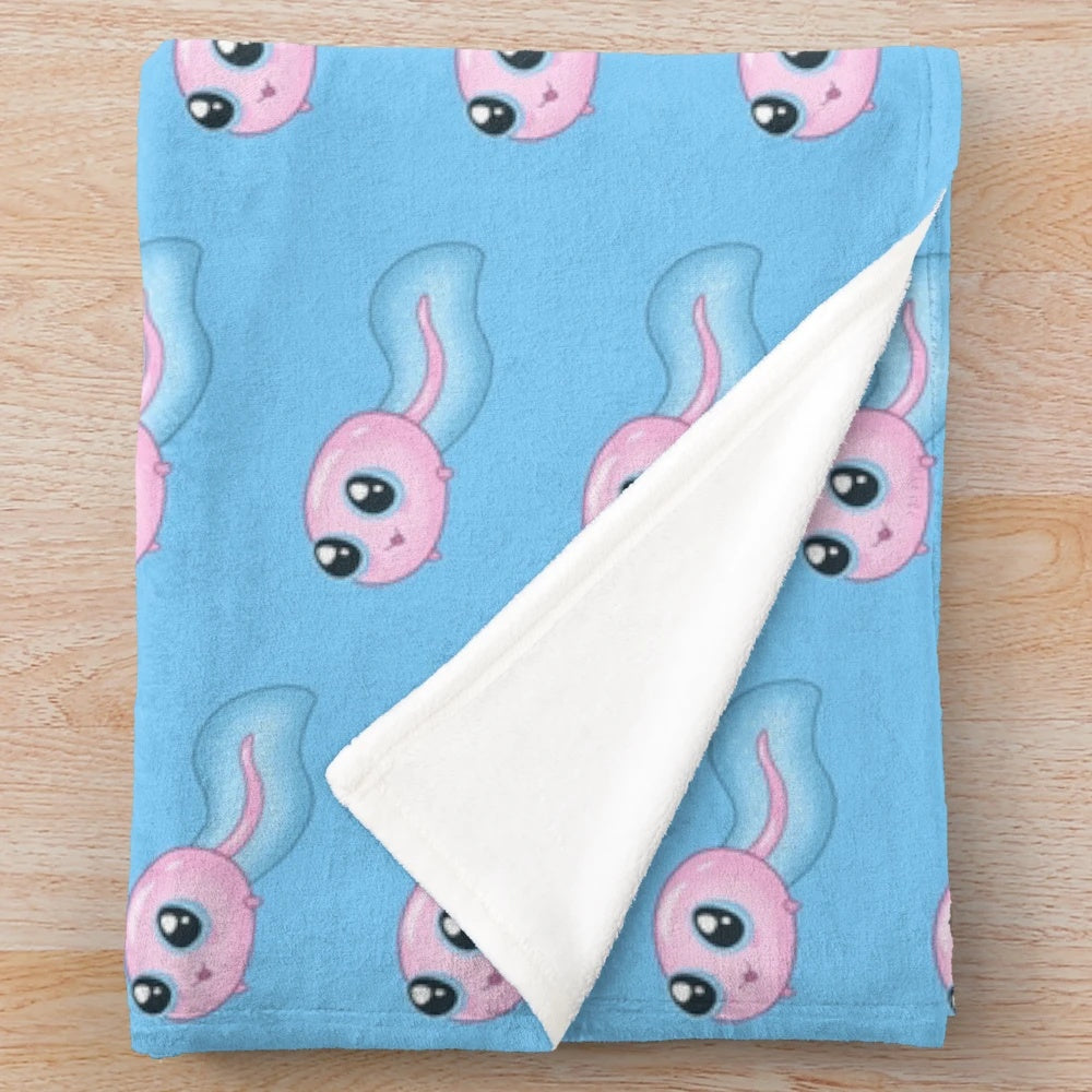 Pastel-colored plush blanket featuring a cute frog pattern