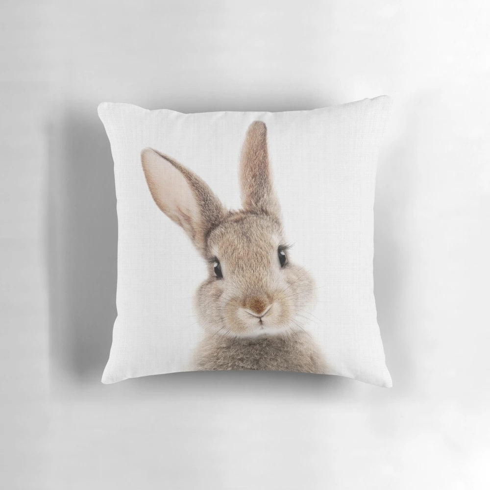 Soft, plush peekaboo bunny pillow in a woodland animal design