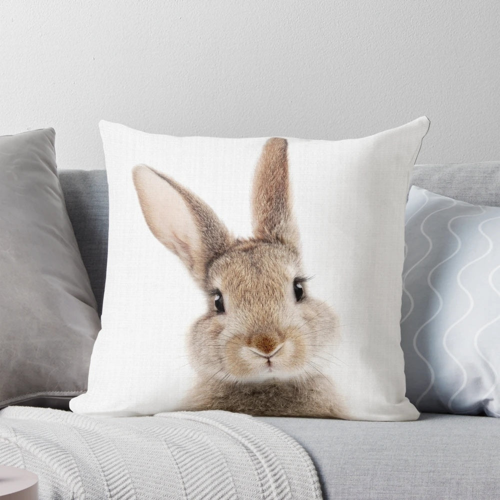 Soft, plush peekaboo bunny pillow in a woodland animal design