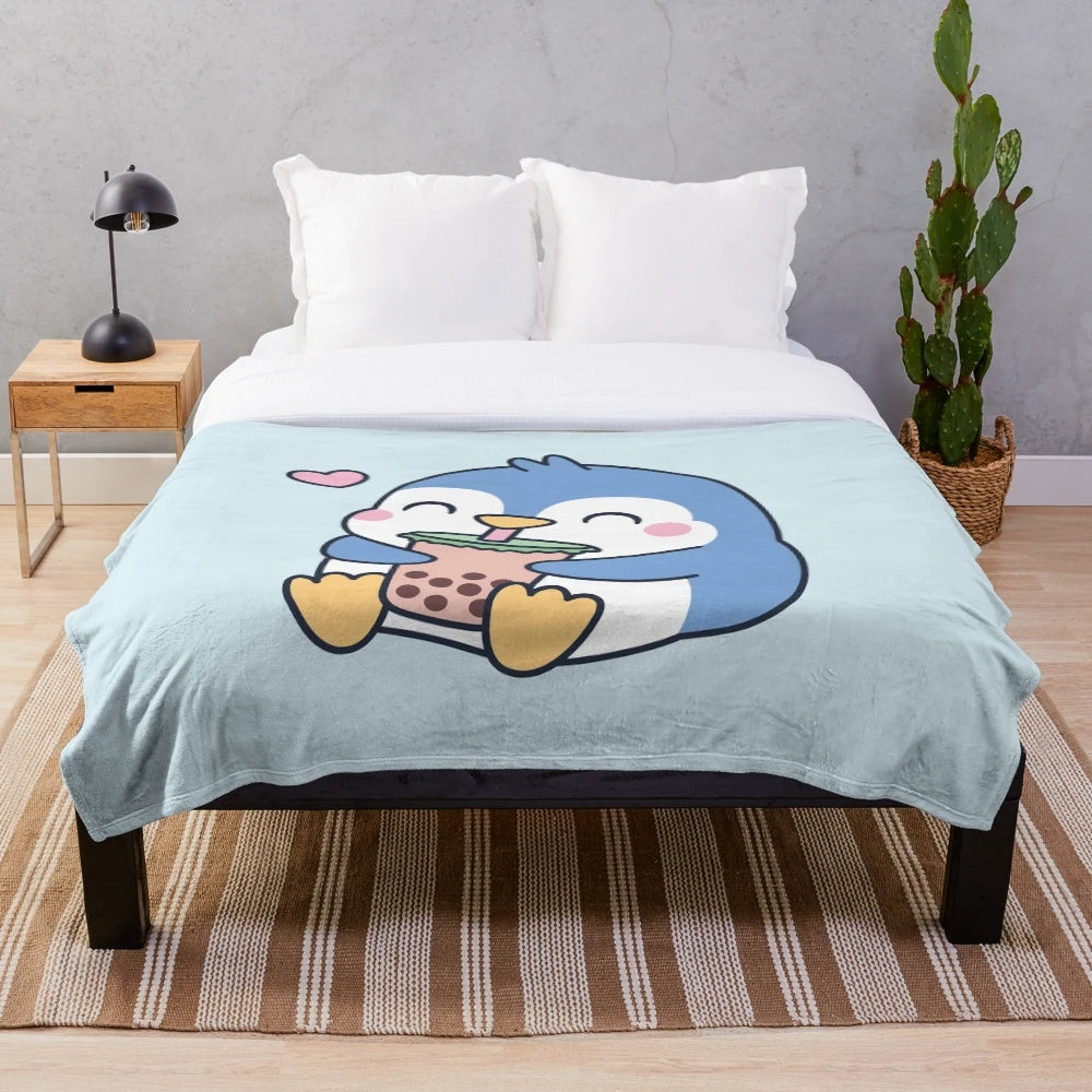 Cute penguin holding a boba tea cup on a soft, cozy plush blanket
