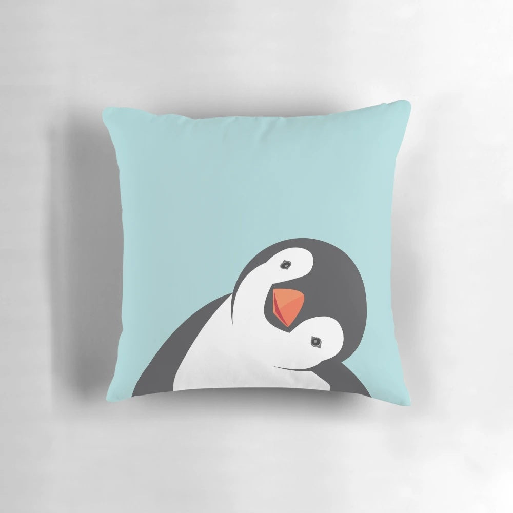 Soft, cuddly penguin plush pillow in teal and white vector art design