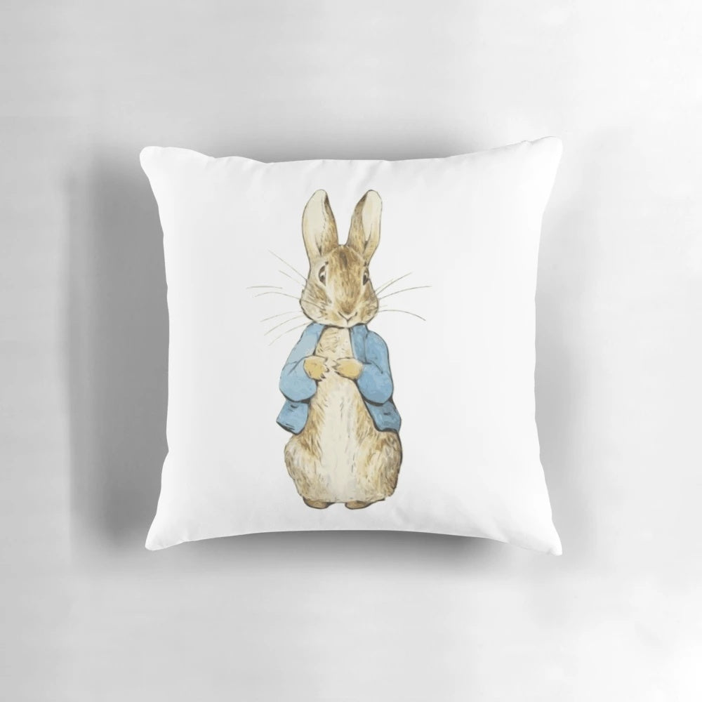 Soft, cuddly Peter Bunny plush pillow featuring a cute cartoon rabbit design inspired by Beatrix Potter's classic stories.