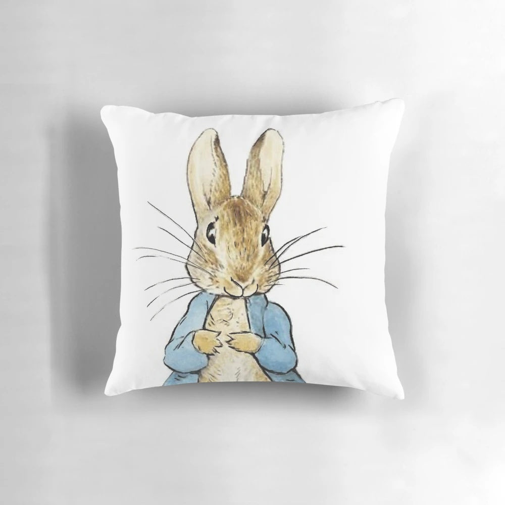 Soft, plush Peter Rabbit pillow by Beatrix Potter, perfect for kids' rooms and nursery decor