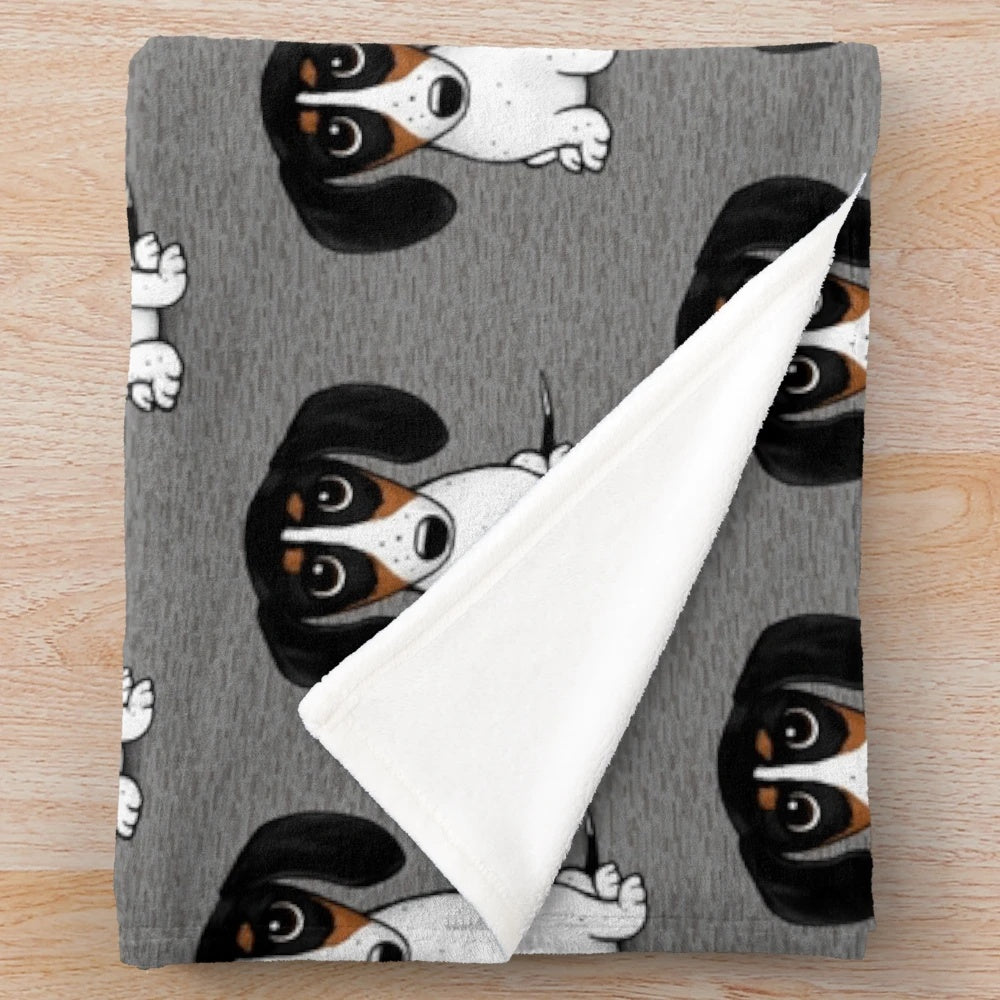 Piebald dachshund plush blanket with a cute, cartoon-style black, tan and white wiener dog design